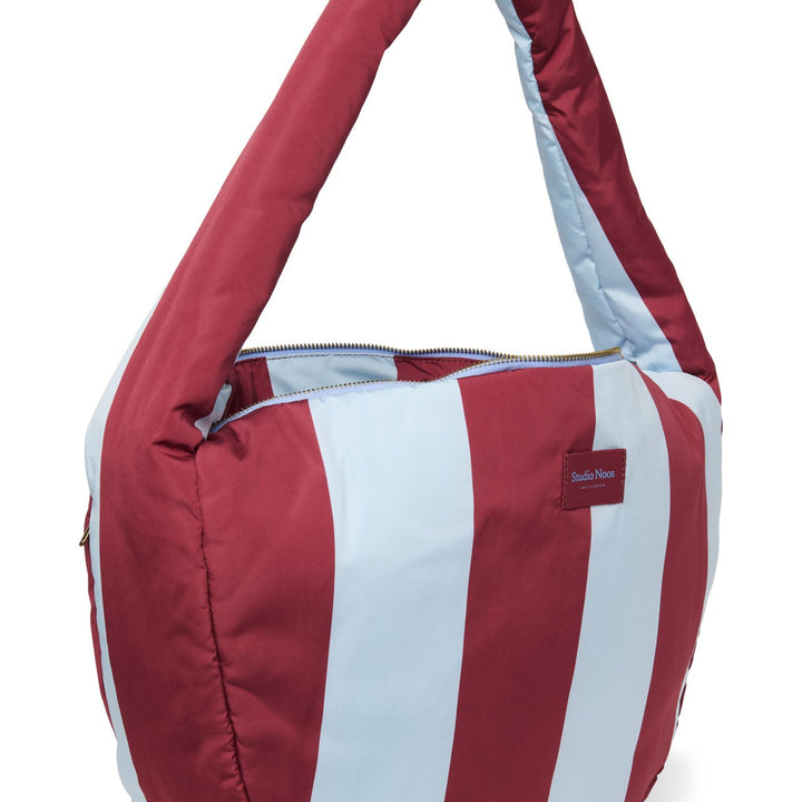 Puffy cross body bag bold stripe
