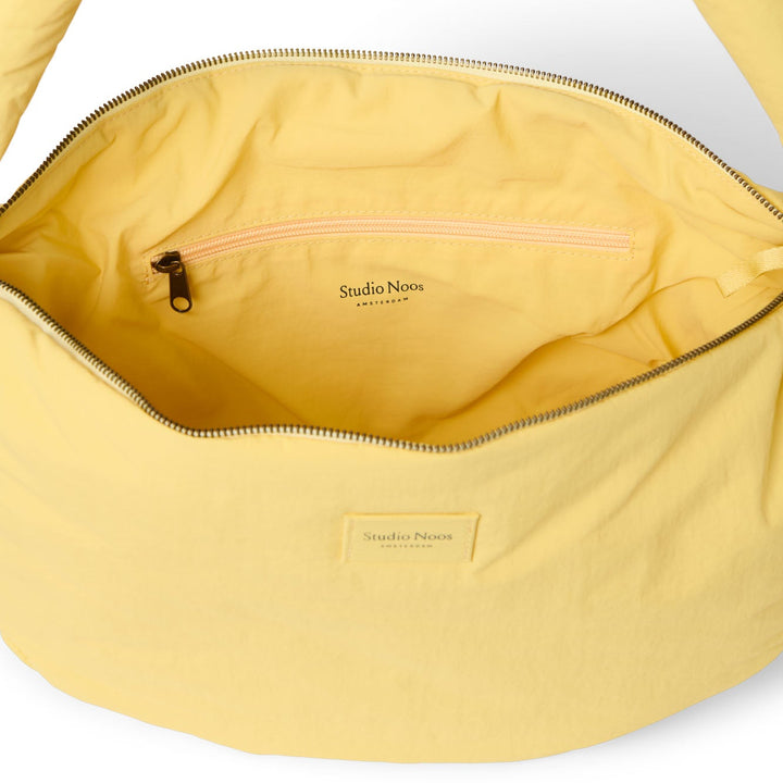 Puffy cross body bag botergeel