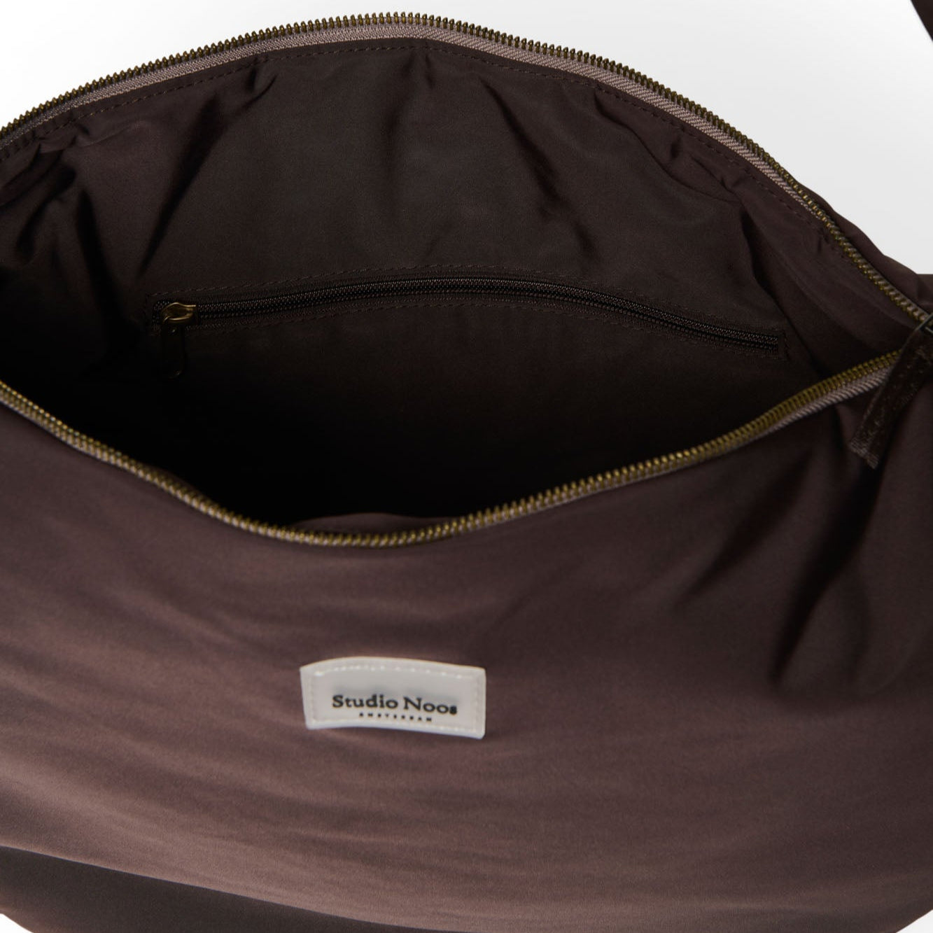 Puffy cross body bag brown