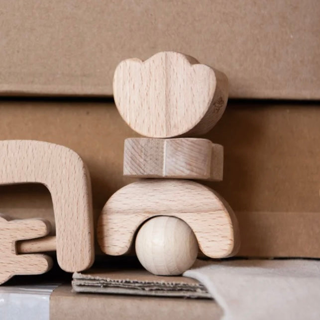 KMR Childwood - Wooden rattle Bloem